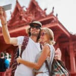 expat couple taking selfie